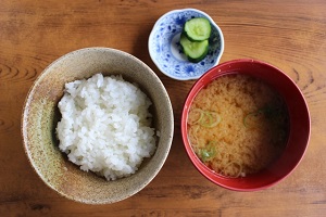 Boiled rice, Miso-soup and Pickles on a table