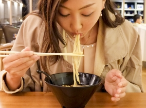Slurping udon noodle