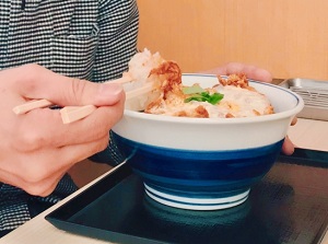 Eating Donburi dish