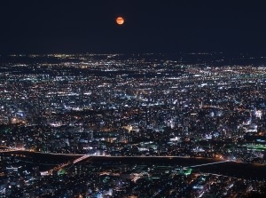 The moon and night view from Mt.Moiwa