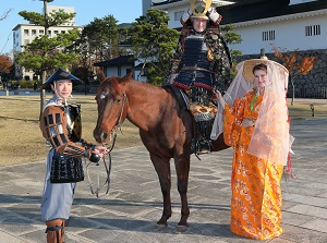 Experience wearing Samurai armor and kimono at Toyama castle