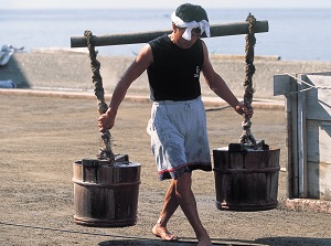 Carrying sea water in Suzu Salt Farm