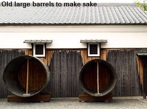Old large barrels to make sake in Gekkeikan Okura Sake Museum