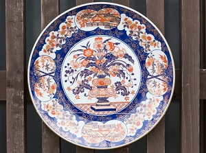 Imari ware decorated by a street in Imari