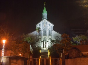 Oura Catholic Church at night